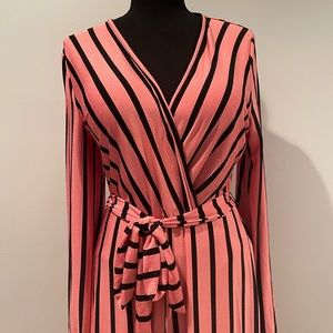 Jumpsuit. Size 1X. Long sleeve. Floor-length. Breathable. Stretchy material.